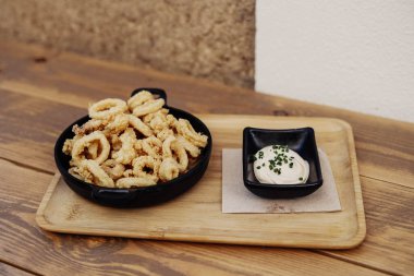 Ration of typical Spanish fried calamari rings