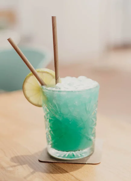 A frozen melon-flavored daiquiri cocktail with rum