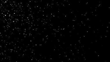Real Snow, falling snow isolated on black background in FHD to be used for composing, motion graphics, Large and small snow snowflakes, Isolated falling snow, , Ethereal, Intense, Storm. High quality