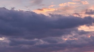 Colorful sunrise or sunset sky with pastel pink cloud golden yellow cloud landscape in tropical summer or spring sunlight n sunshine before hurricane, slow motion 4k cinemagraphs b-roll TimeLapse