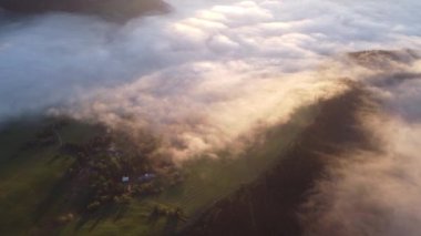 The fog is spreading in the spring landscape in the glow of the rising sun in the beautiful spring nature. High quality 4k footage