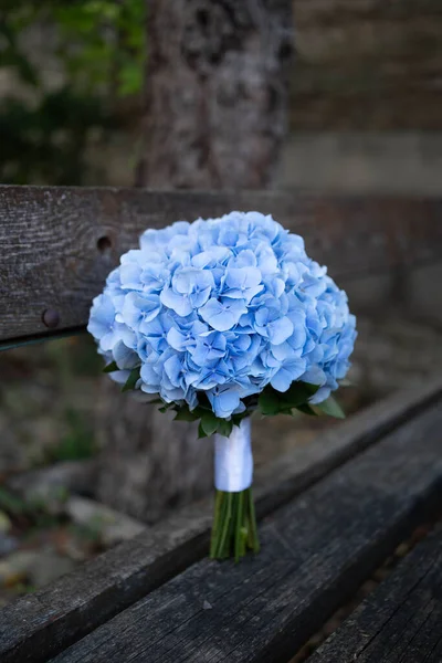 Blue hydrangea wedding bouquet. Bridal bouquet. Wedding day.