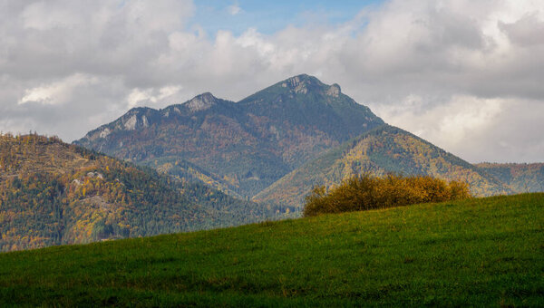 Autumn Mountain Landscape.. View of the peak Velky Choc in Hoczanskie Mountains Range. Zilina Region. Beszeniowa Slovakia.