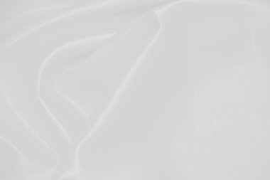 Yumuşak dalgalı soyut beyaz kumaş arkaplanı