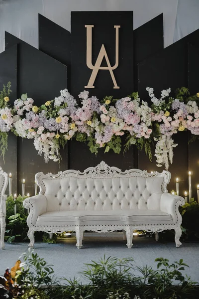 Madiun, East Java, Indonesia on June 3, 2021. Wedding decorations made of wood decorated with fresh flowers. It is made to beautify the wedding day, which is arranged by a reliable wedding organizer.