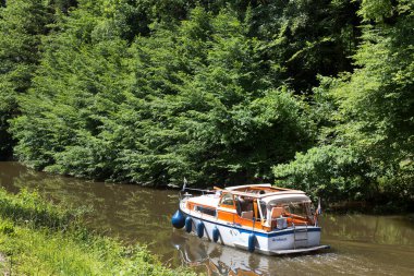 Tourist boat floating in river