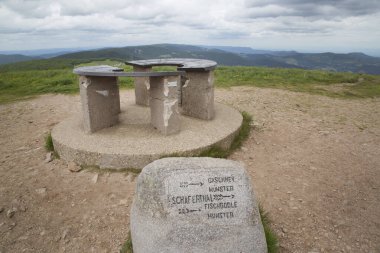Stone bench on mountain hill