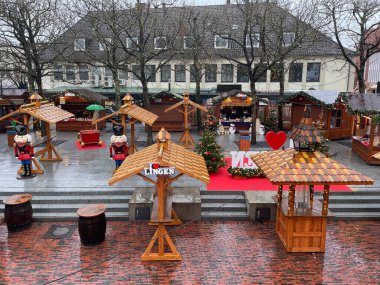 Germany, Lingen - December 10, 2023: Decorated Christmas market in the old center of Lingen, Germany. clipart