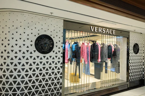 Florence, Italy - March 27, 2023: Louis Vuitton logo on the store showcase.  Stock-Foto