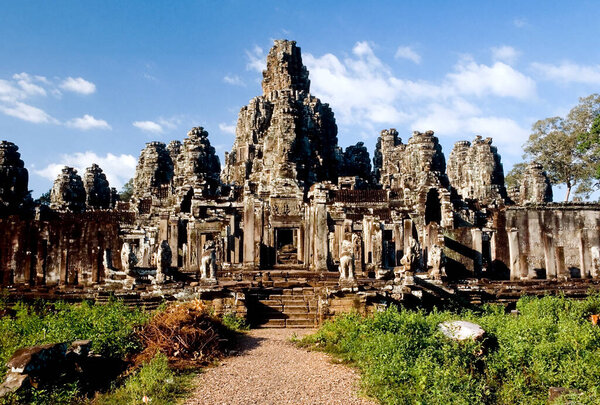 Bayon Temple is a Khmer temple related to Buddhism at Angkor Wat Comples in Cambodia. Built in the late 12th or early 13th century as the state temple of the King Jayavarman VII  the Bayon stands at the centre of Jayavarman's capital, Angkor Thom.