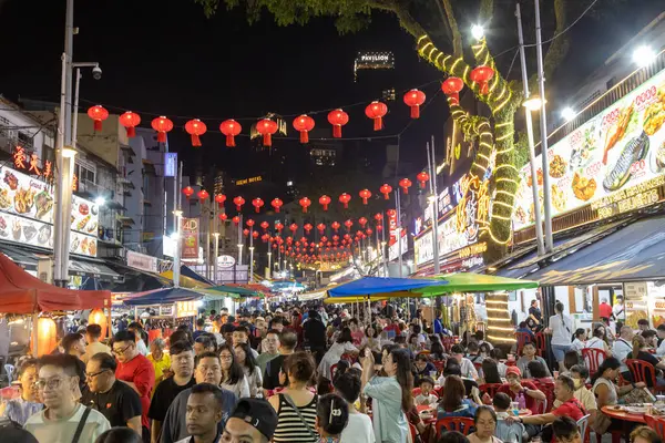 Stock image Kuala Lumpur, Malaysia - February 9, 2024: A crowded street scene of Jalan Alor a street food night market located in the Bukit Bintang area of Kuala Lumpur, Malaysia. 