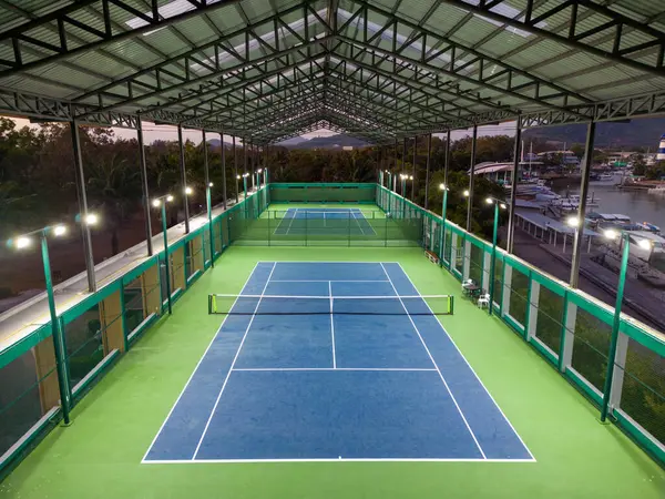 stock image Phuket, Thailand - February 28, 2023: Covered tennis court at RPM Royal Phuket Marina located in Phuket, Thailand.