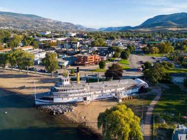 Penticton, Canada - September 15, 2024: Aerial drone view of SS Sicamous on the shore of Okanagan Lake in Penticton, British Columbia, Canada. Located in the Okanagan Valley. clipart