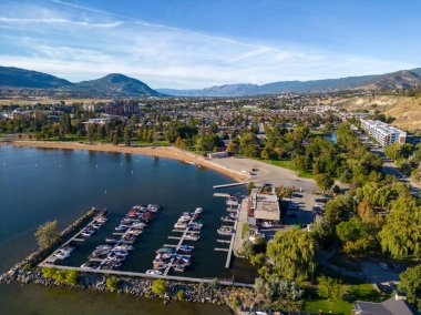 A drone areial view overleooking the marina and Skaha Beach on Skaha Lake, located in the city of Penticton, British Columbia, Canada. Penticton is located in the Okanagan Valley. clipart