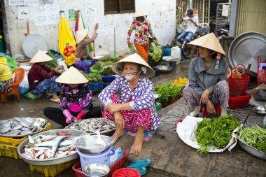 Duong Dong, Phu Quoc Island, Vietnam - January 25, 2018: Vietnamese market vendors selling fresh seafood at the Duong Dong Market located in Duong Dong, Phu Quoc Island, Vietnam.