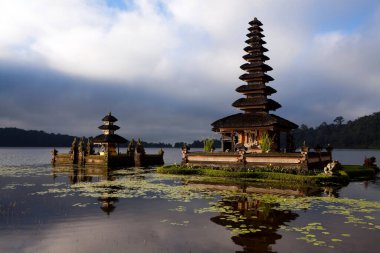 Pura Ulun Danu Beratan, or Pura Bratan, is a major Hindu Shaivite temple in Bali, Indonesia. The temple complex is on the shores of Lake Beratan in the mountains near Bedugul. clipart