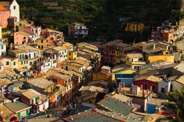 View of ancient colorful buildings in Vernazza. Village between mountains and the Ligurian sea. Famous touristic place and travel destination in Italy. Cinque Terre. UNESCO World Heritage Site.