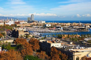 Barcelona, Spain-January 02,2016:Picturesque aerial landscape view of Port Vell with Maremagnum shopping mall, moored yachts and ships in Barcelona. Travel and tourism concept. 