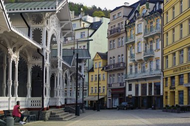 Karlovy Vary, Czech Republic-April 09,2024:Picturesque view of vintage colorful buildings in old town of Karlovy Vary. Famous SPA health resort in the Czech Republic. Travel and tourism concept.   clipart