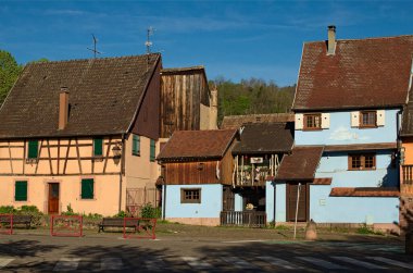 Picturesque landscape view of colorful ancient houses in Riquewihr village, France. The Riesling and other wines produced in this village. Famous touristic place and romantic travel destination. clipart