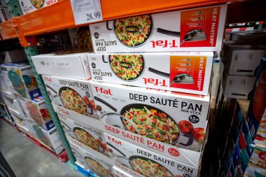 Los Angeles, California, United States - 05-20-2022: A view of several cases of T-Fal deep saute pans, on display at a local big box grocery store.