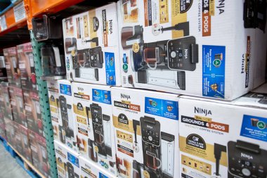 Los Angeles, California, United States - 05-20-2022: A view of several cases of Ninja DualBrew coffee making machines, on display at a local big box grocery store.