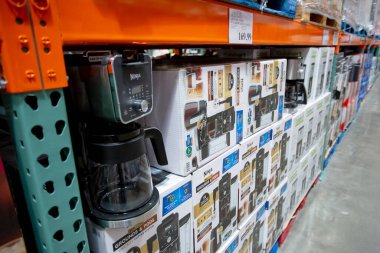 Los Angeles, California, United States - 05-20-2022: A view of several cases of Ninja DualBrew coffee making machines, on display at a local big box grocery store.