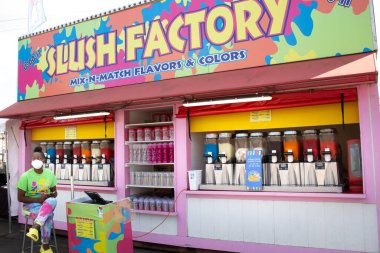 Puyallup, Washington, United States - 09-13-2021: A view of the Slush Factory frozen drink food stand, seen at the Washington State Fair.