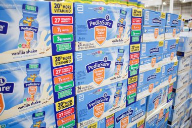 Los Angeles, California, United States - 09-13-2021: A view of several cases of PediaSure Grow and Gain kids nutritional shakes on display at a local big box grocery store.