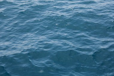 A view of calm ocean water texture, as a background.