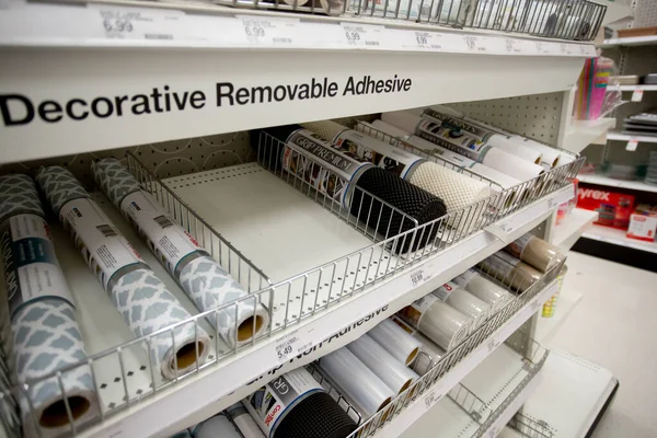 stock image Los Angeles, California, United States - 05-20-2022: A view of several shelf dedicated to rolls of drawer liner, on display at a local department store.