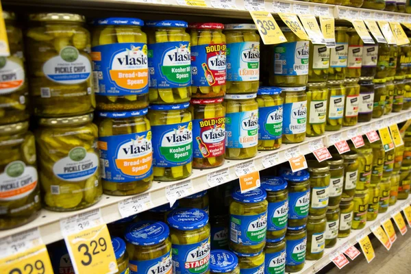 stock image Los Angeles, California, United States - 05-20-2022: A view of several shelves dedicated to pickle jars, featuring the Vlasic brand, seen at a local grocery store.