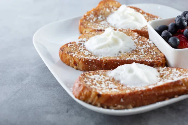 A view of a plate of french toast.