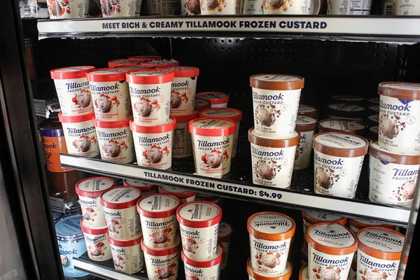 stock image Tillamook, Oregon, United States - 09-19-2021: A view of several shelves of Tillamook ice cream cartons, on display at a local grocery store.