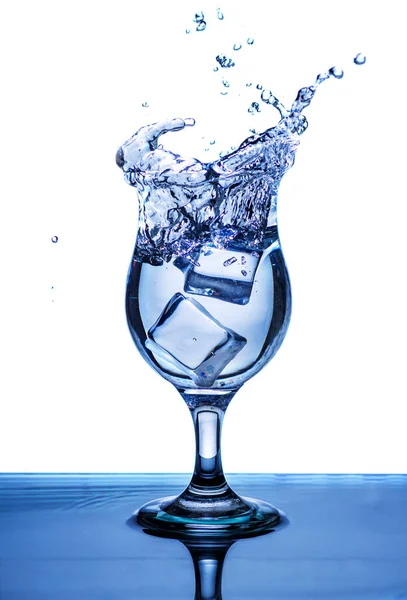 The image of pouring drinking water, into a broken glass, that makes one feel refreshed on blurred white background, Splashing water, Sparkling water