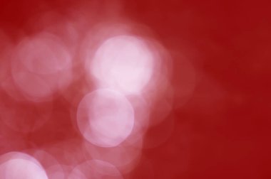 Aydınlık kırmızı bokeh noel çemberi renk simleri bulanık siyah arkaplan