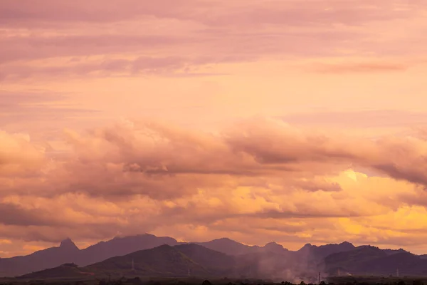 stock image View of landscape nature and mountain with sunlight and sunset or sunrise in morning light, Abstract and pattern of cloud sky Calming coral, Orange, Trend color of the year background