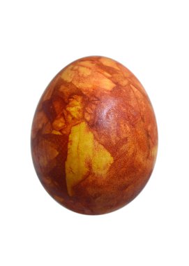Easter egg dyed with onion skin isolated on white background. Natural Easter concept.