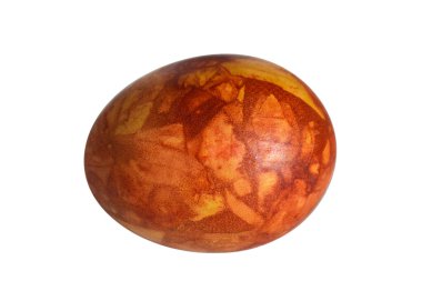 Easter egg dyed with onion skin isolated on white background. Natural Easter concept.