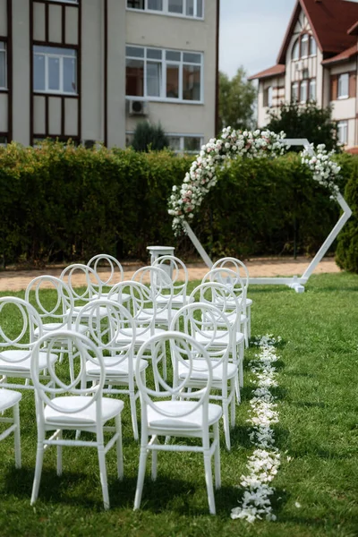 stock image wedding ceremony area, arch chairs decor