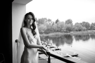 morning wedding celebration with wedding dress and veil clothes