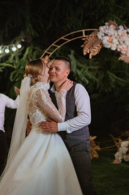 newlyweds at a wedding in the corridor of sparklers