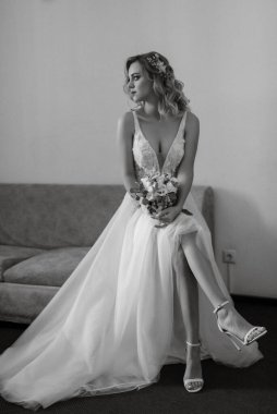 morning of the bride with the creation of the image of makeup and the creation of hairstyles