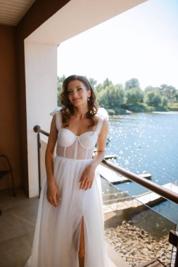 morning of the bride with the creation of the image of makeup and the creation of hairstyles