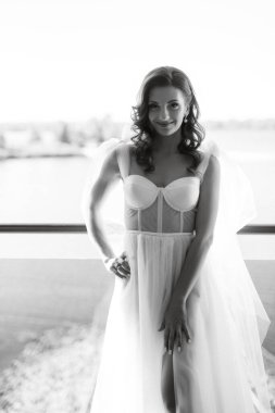 morning of the bride with the creation of the image of makeup and the creation of hairstyles