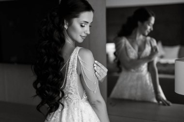 morning of the bride with the creation of the image of makeup and the creation of hairstyles