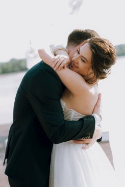 the first dance of the bride and groom inside a restaurant with heavy smoke