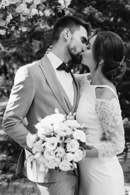 wedding ceremony of the newlyweds on the glade near the restaurant