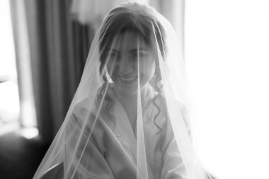 morning of the bride with the creation of the image of makeup and the creation of hairstyles