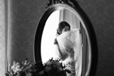 morning of the bride with the creation of the image of makeup and the creation of hairstyles